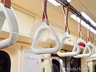 Handrails in subway train Public Transportation Stock Photo