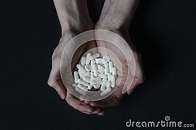 Hands addict syringe drugs tablets Stock Photo