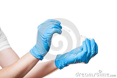 Hands in a blue sterile gloves to give cotton swab to glass bottle for sampling smear analysis. Stock Photo