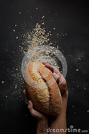 Hands with a bread Stock Photo
