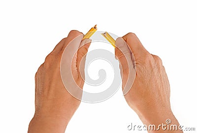 Hands breaking pencil Stock Photo