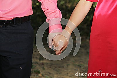 Young couple holding hands Stock Photo