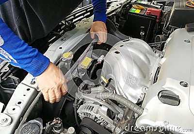 Hands of car mechanic Stock Photo