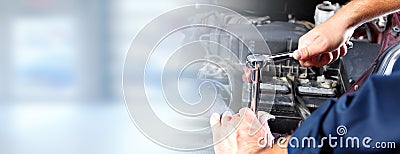 Hands of car mechanic in auto repair service. Stock Photo