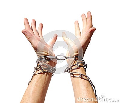 Hands chained together Stock Photo