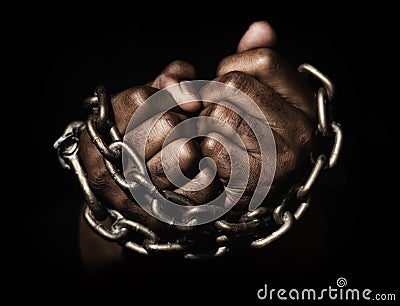 Hands in chains Stock Photo