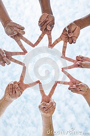 Hands in circle star, blue sky and community in collaboration for global support, trust and diversity. Teamwork, hand Stock Photo