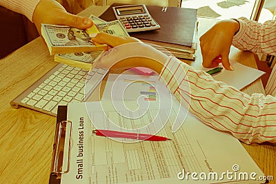 Hands close up. Loan, credit, debt concept. Hand giving money Stock Photo