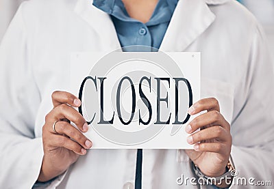 Hands closeup, closed sign and small business for store, pharmacy or shop in recession, bankrupt and retail. Woman Stock Photo