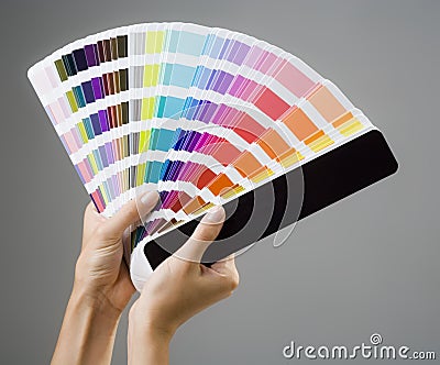 Hands and color guide Stock Photo