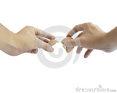 Hands cracking an egg on white background Stock Photo