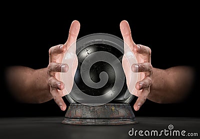 Hands On Crystal Ball Stock Photo