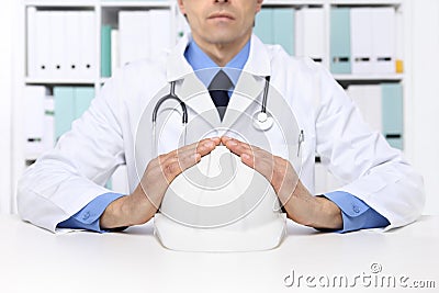 Hands doctor protect helmet worker, medical health insurance con Stock Photo