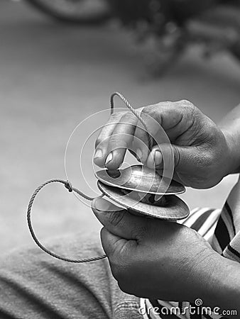 Hands and finger cymbals Stock Photo