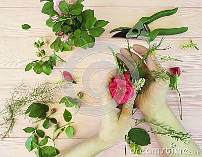 Hands florist flowers decorative view from above scissors workspace professional Stock Photo