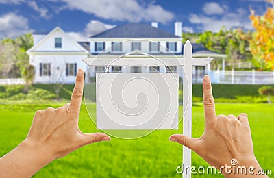 Hands Framing Blank Real Estate Sign and New House Stock Photo