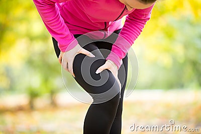 Hands grabbing a hip, sport injury Stock Photo