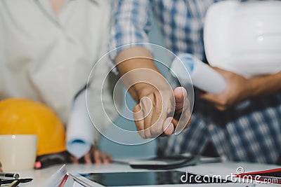 Hands of group engineer and architect working on blueprint Stock Photo