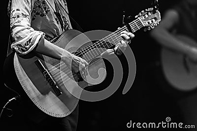 Hands of guitarist perform at live gig Stock Photo