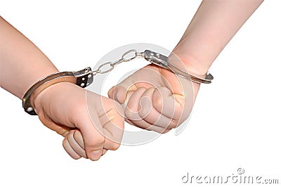 Hands in handcuffs Stock Photo