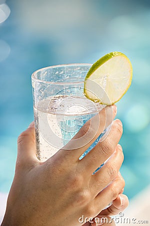 Hands holding drink glass. Stock Photo