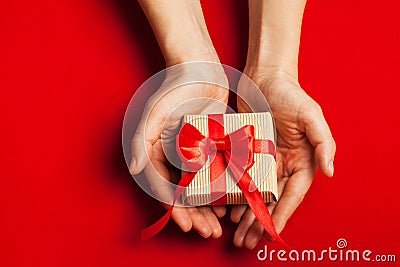 Hands holding a gift Stock Photo