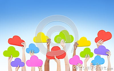 Hands Holding Multi Coloured Cloud Shaped Stock Photo