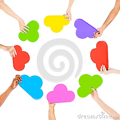 Hands Holding Multicoloured Cloud Shaped Stock Photo