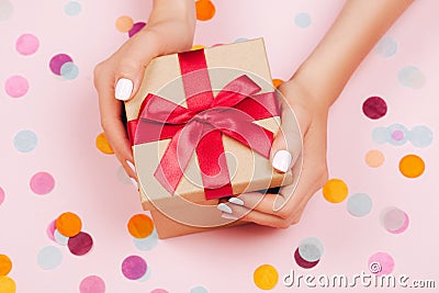 Hands holding present box Stock Photo