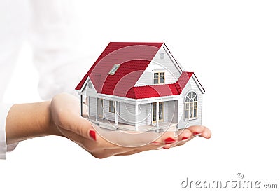 Hands holding a small house isolated on white Stock Photo