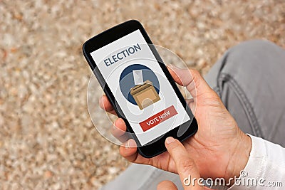 Hands holding smart phone with online voting concept on screen Stock Photo