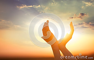 Hands holding the sun Stock Photo