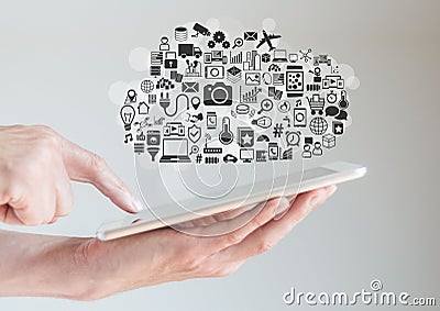 Hands holding tablet with cloud computing and mobility concept Stock Photo