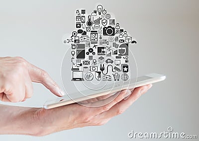 Hands holding tablet with smart home automation and mobility concept Stock Photo