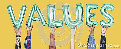 Hands holding values word in balloon letters Stock Photo