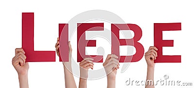 Hands Holding the Word Liebe Stock Photo