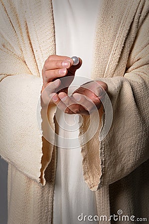 Hands of Jesus Holding Pearl Stock Photo