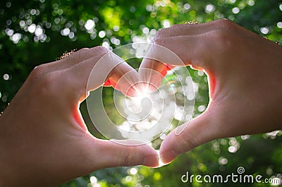 Hands heart sunshine Stock Photo