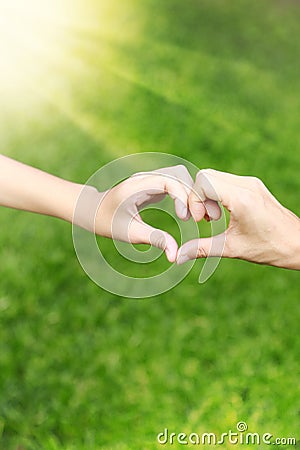 Hands love together of Mom and her daughter Stock Photo