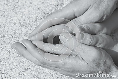 Hands of man and woman intertwined Stock Photo