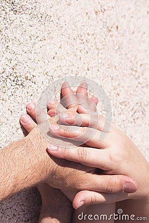 Hands of man and woman intertwined Stock Photo