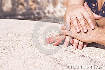 Hands of man and woman intertwined Stock Photo