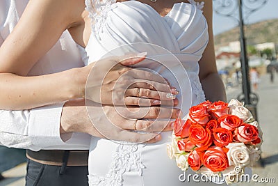 Hands of newly wedded after wedding ceremony Stock Photo