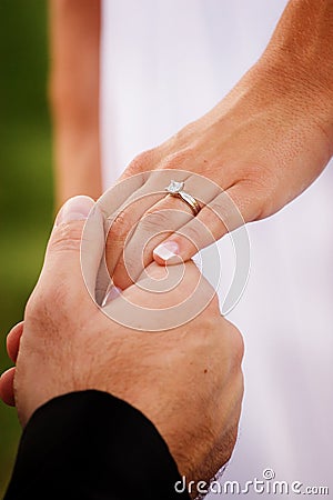 Hands of newlywed couple Stock Photo