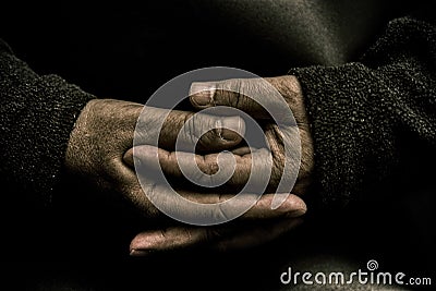 Old Hands. Portrait of hands that intertwine their fingers Stock Photo
