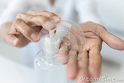 Hands of old people,elderly using alcohol antiseptic gel,cleaning,prevent infection,protective outbreak of Covid-19,senior woman Stock Photo