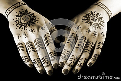 Hands with oriental tattoo Stock Photo