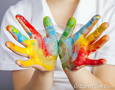 Hands painted in colorful paints Stock Photo
