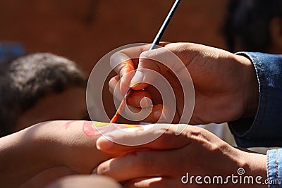 Hands painting Editorial Stock Photo