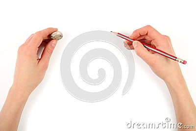 Hands with pencil and erase Stock Photo